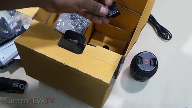 Unboxing the 16MP Sony Apha SLT-A57 Digital SLT with SAL1855 Lens - Cursed4Eva.com смотреть онлайн