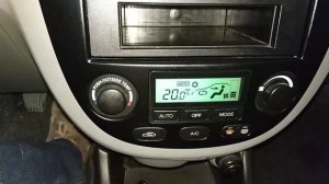 Включение климат контроля лачети в автоматический режим.