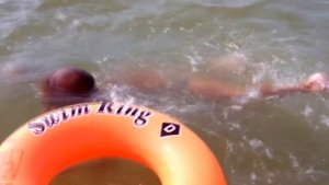 Отдых на море. Мальчик и надувной круг. Sea tour. A boy and a swim ring.