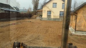 Выравнивание участка трактором под посадку газона.
