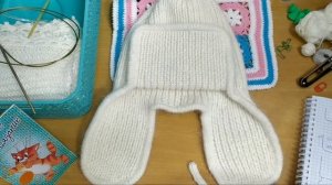 Видео шпаргалка. Шапка ушанка спицами из пряжи пух норки. Что пошло не так.