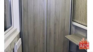 Шкаф купе и откидной столик для ноутбука на лоджии