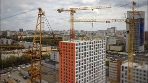 Стройка. Башенный кран КБ 515. Башенный кран POTAIN. ЖК Амурский Парк. Вид с высоты
