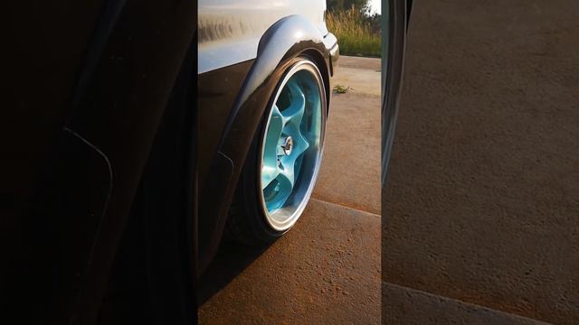 Tucked Schmidt Space line wheels on a bagged Peugeot 106