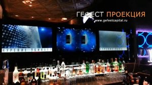 Компания ГЕФЕСТ ПРОЕКЦИЯ выполнила инсталляцию 3 прозрачных матриц 50 дюймов для BARREL BAR