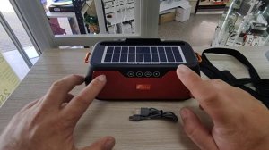 Распаковка колонки-радиоприемника Fepe на аккумах и солнечных батареях.