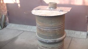 Бочка для сжигания мусора из жедезных дисков автомобиля .