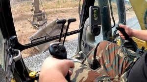 Формирование откосов планировочным ковшом.