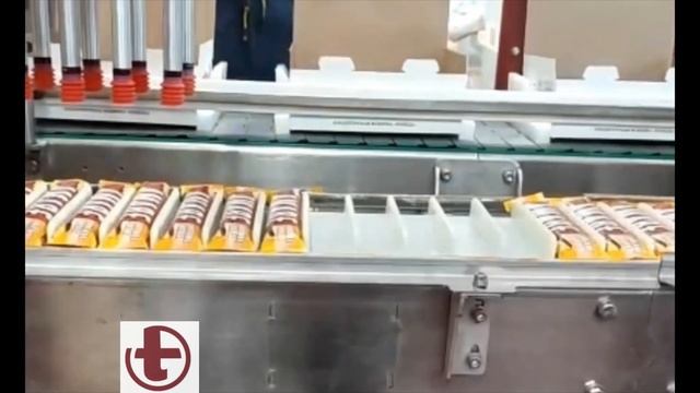Укладка шоколадных батончиков в шоу-боксы.