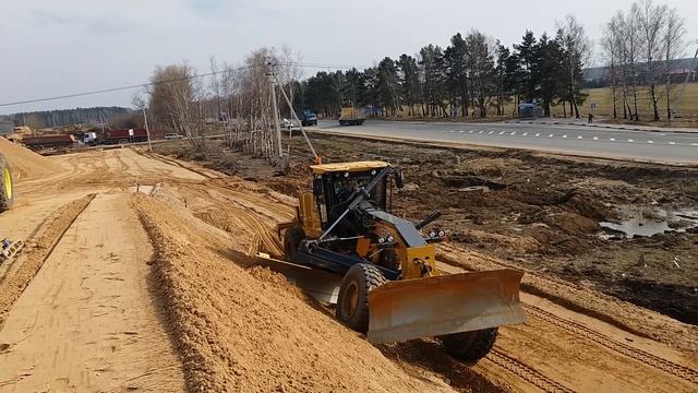 Планировка откосов насыпи автогрейдером JONNDEER ЦКАД смотреть онлайн