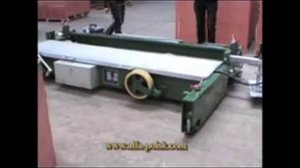 Работа укладчика резиновой крошки в покрытия.wmv