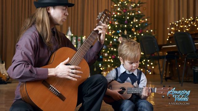 4-Year Old Boy Plays on Ukulele His First Music with Teacher - Fragment From Live New Year Concert смотреть онлайн