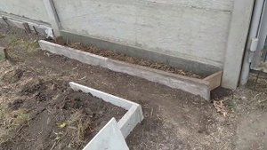 Высокая грядка из бетонного забора