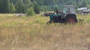 сенокос юмз косит траву с навесной косилкой крн-2.1 сегментная