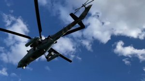 Боевые вертолёты Ка-52 и транспортно-штурмовой Ми-8АМТШ ВКС России над Донецком