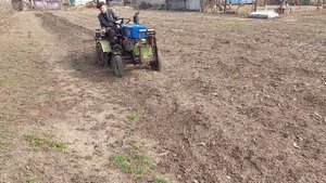 Испытания мототрактора на грунтозацепах.