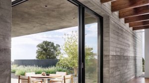 Concrete House Design On A Sunken Plane Offers Expansive Views Of Distant Mountains