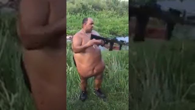 Fat man fires gun