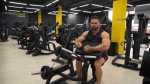 Обзор на тренажер "Бицепс машина сидя" от Ultra Gym.