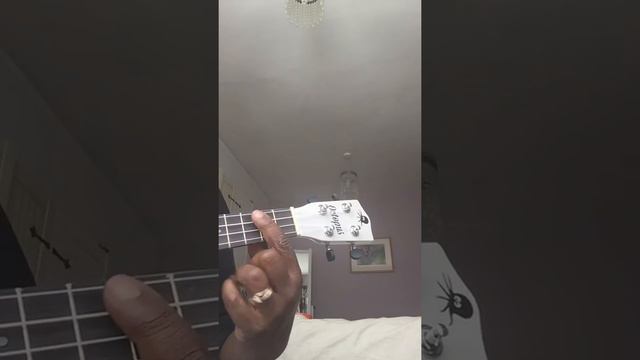 Bm7 (B minor 7) and Eb6 (E flat 6) chords on ukulele.