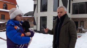 Фиброцементный сайдинг под дерево и камень для облицовки фасада частного дома из арболитовых блоков
