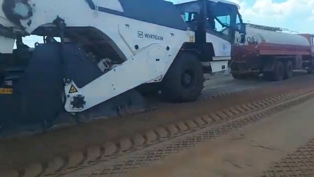 Устройство подстилающего слоя из грунта, укрепленного неорганическим вяжущим с добавлением роудзайм смотреть онлайн