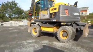 2014 Volvo EW140 D w/ oilquick rotor tilt & bucket