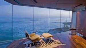 Самые необычные дома в мире / Стеклянные фасады домов