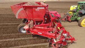 Worlds largest potato planter, SPUDNIK 8312 Twelve Row folding Potato Planter