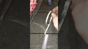 Приспособление для затяжки ленточных хомутов .