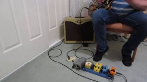 My small pedalboard with Ibanez AS-50 and Peavey Classic 30