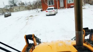 Уборка снега на территории Экскаватором Погрузчиком
