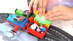 Diana and Roma play with toy trains