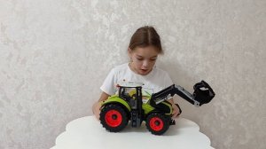 Игрушка трактор | большой | зелёный трактор с ковшом | Детишки ребятишки .
