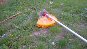 Мотор для мотокосы в действии