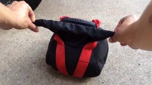 Песочная гиря RockyJam. Закрывание гири