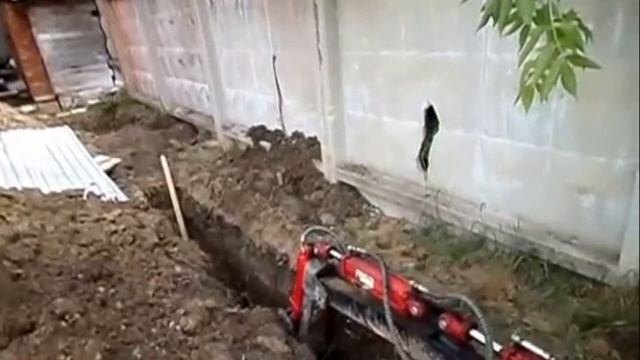 Мини-экскаватор прицепного типа Landformer