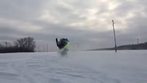 Вилли на снегоходе.