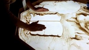 Рисование песком на стекле