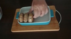 Сочные мясные биточки с кабачком в духовке, запечённые в сливочном соусе.