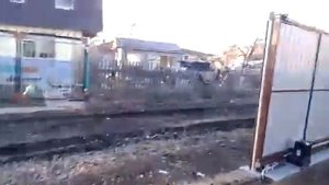 Откатные ворота со встроенной калиткой и приводом автоматического открывания.