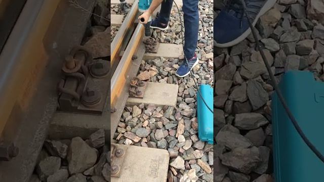 Makita machine use. Bolt opening on railway track