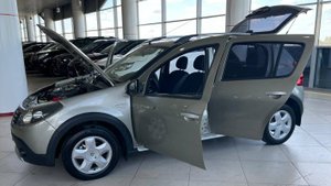 Renault Sandero Stepway I (2009—2014) 1.6 MT (84 л.с.) Базовая