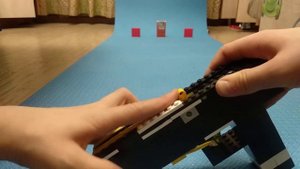 Автоматический пистолет из лего,стреляет резинками