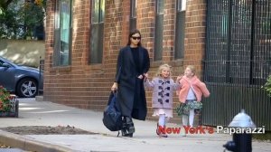 Irina Shayk and her daughter Lea Cooper seen walking home.