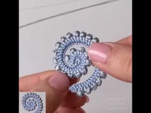 Завиток с обвязкой пышными столбиками закрученный влево