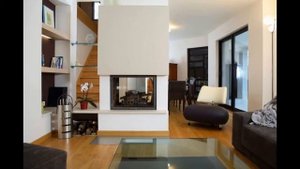 Дизайн и интерьер гостиной с камином