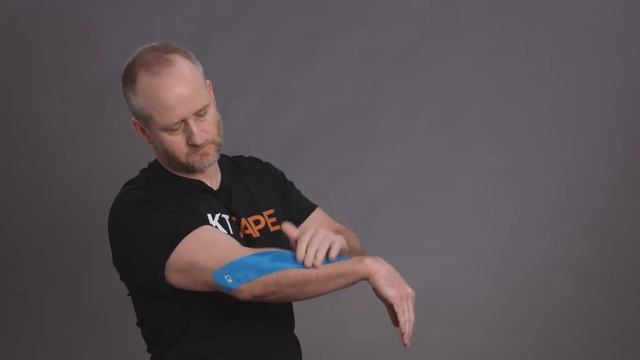 Тейпирование локтя