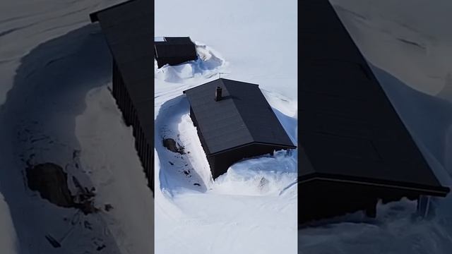 Lonely Cabin Covered in Snow