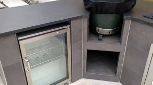 Big green egg built in corner with Beefeater Proline